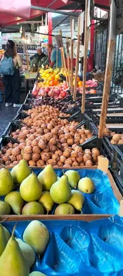 a market filled with lots of fruits and vegetables at Goodnight Palermo - Ceres Apartment in Palermo