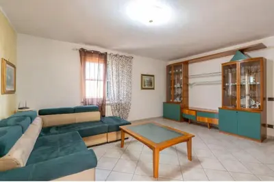 a living room with a couch and a table at Villa Oasi della Pace based in Partinico in Partinico