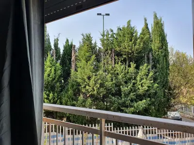 a view from a window of trees at Apartment Happy House by Interhome in Palermo