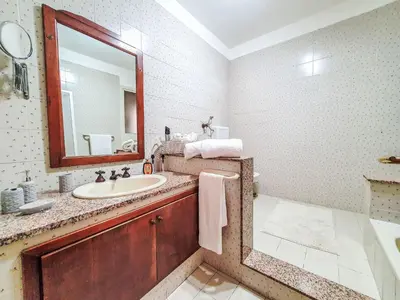 a bathroom with a sink and a mirror at Apartment Happy House by Interhome in Palermo