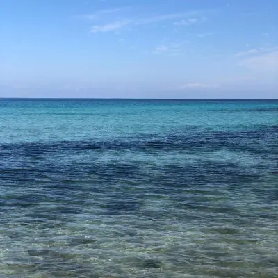 a large body of water with the ocean at Villa Castelforte, con piscina a Mondello in Palermo