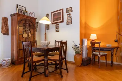 a dining room with a table and chairs at GuestHost - Casa Giacomo in central Palermo in Palermo
