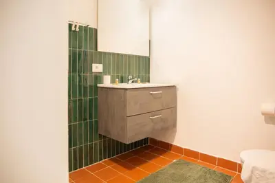 a bathroom with a sink and a mirror at Solemar Sicilia - Casa Alba in Santa Flavia