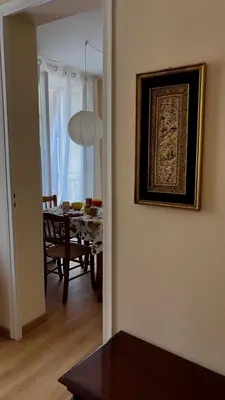 a kitchen with a white refrigerator and a washing machine at Casa Rubino al Massimo in Palermo