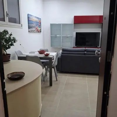 a living room with a couch and a table at Casa Bruno in Palermo