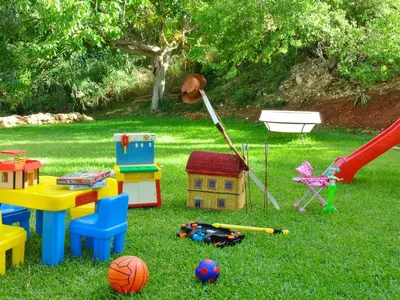 a bunch of play equipment in the grass at Holiday Home Villa Tommaso Maruggi Jacuzzi und privater Pool by Interhome in Alcamo