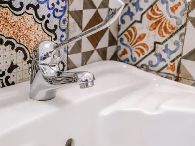 a bathroom sink with a silver faucet at Apartment Wohnung Glicine mit Schwimmbad und Meerblick by Interhome in Balestrate