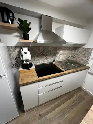 a kitchen with a sink and a counter top at A CASA DI LILLY - BALLARò' - in Palermo