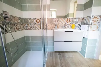 a bathroom with a shower and a sink at iFlat Casa Sant'Agata in Palermo