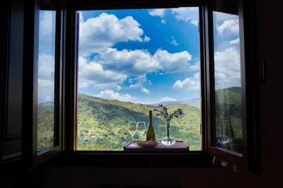 a window with a view of a mountain view at Agriturismo Case Varisco in Altavilla Milicia