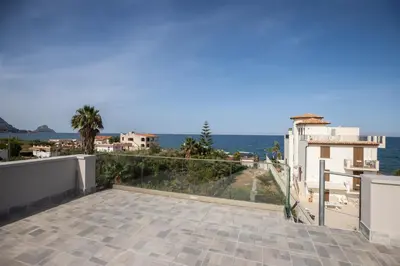 a view of the ocean from the balcony of a house at Richgood Luxury homes - Villa Zefira sole in Altavilla Milicia