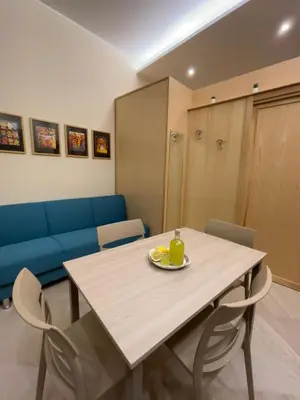 a dining room with a table and chairs at Tra chiazza e casteddu in Mezzojuso