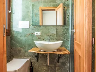 a bathroom with a sink and a mirror at Villa Cleope by Interhome in Castellammare del Golfo
