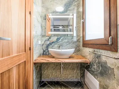 a bathroom with a sink and a mirror at Villa Cleope by Interhome in Castellammare del Golfo