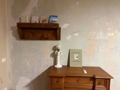 a air conditioner in a room with a window at Xenia Signature Guest House in Palermo