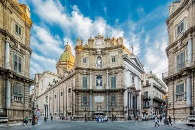 a large building with a statue in front of it at Historic Center - Apartment with 2 Bedrooms in Palermo
