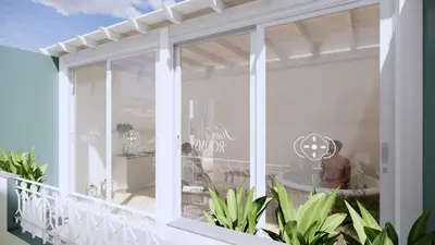 a balcony with a view of the ocean at Lina's Room in Cinisi