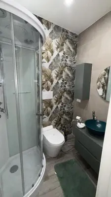 a bathroom with a shower and a toilet and a sink at Vanila Dream's House in Palermo