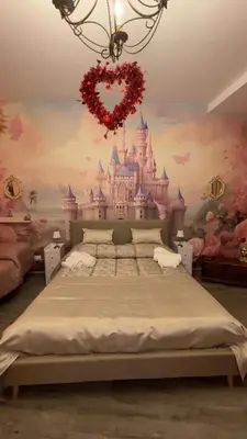 a bedroom with a castle mural on the wall at Vanila Dream's House in Palermo