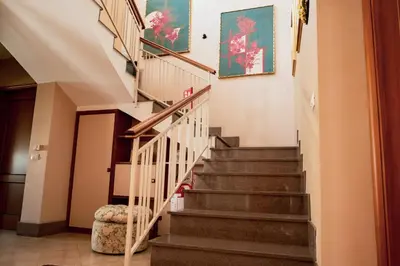 a staircase in a home with a stair case at Agelina square Home Gibellina in Nuova Gibellina