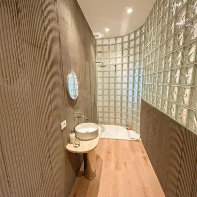 a bathroom with a sink and a bath tub at Palazzo Crisafulli Suite in Palermo