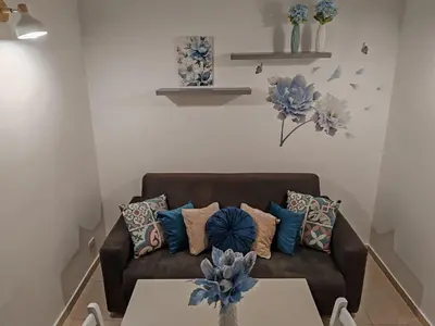 a room with a bed with pillows at Central Station Apartaments Casa Vacanze in Palermo