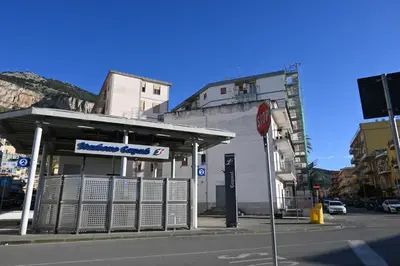 a gas station on the corner of a street at Alla Metro in Capaci