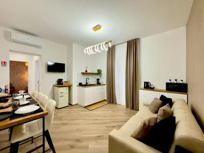 a living room with a couch and a table at Gemy House in Palermo