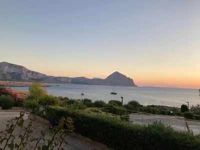 a view of the water with a mountain in the background at Paradiso Isulidda in Macari