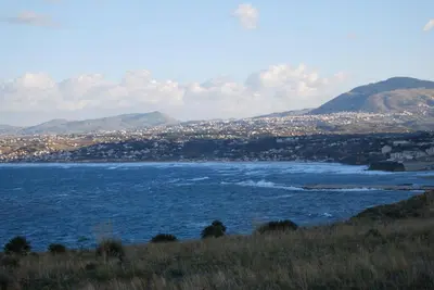 a view of a large body of water with a city at Casa Vacanze La Terrazza Sul Golfo in Castellammare del Golfo