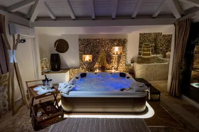a large bathroom with a large tub in a room at Villa esclusiva Milazzo Annarita in Castellammare del Golfo