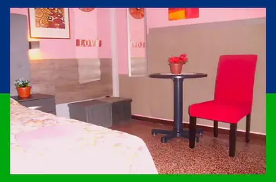 two chairs sitting next to each other in a room at Santa Oliva Homestay in Palermo