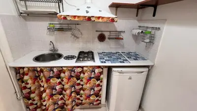 a kitchen with a sink and a counter with canned food at Casa Il Papiro TRS-IT-SIC-20280 in Palermo