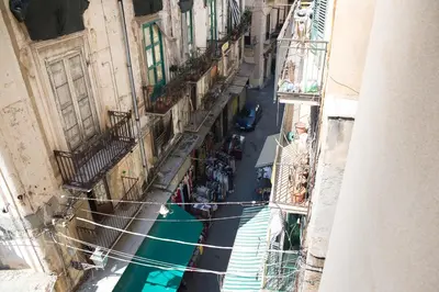 an overhead view of an alley with people on the street at Colors B&B in Palermo