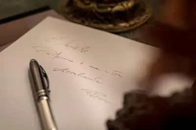 a pen sitting on top of a piece of paper at Dimora Torremuzza in Palermo