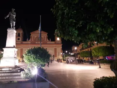 a statue in front of a building at night at Casa Josephine in Balestrate