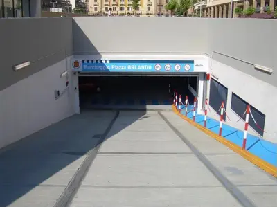a subway station with a tunnel with a sign on it at Kemonia in Palermo