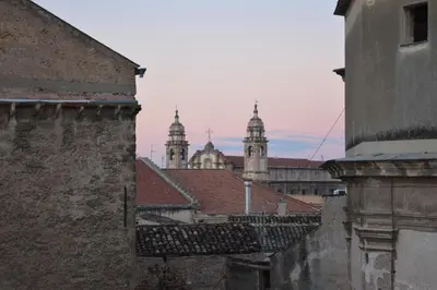 a group of buildings with domes in the background at Attico 261 - Penthouse in Palermo