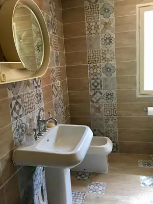 a bathroom with a sink and a mirror at Villa lo Iacono in Terrasini