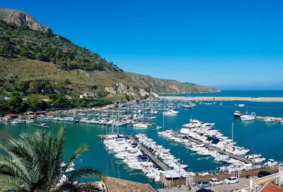 a bunch of boats docked in a harbor at Sopra Le Mura in Castellammare del Golfo