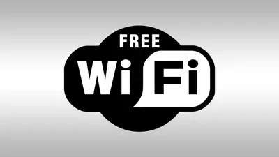 a black speech bubble with the word free wifi and the text free wifi at Appartamento da Andrea in Alcamo