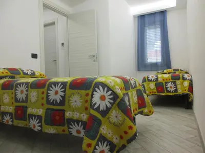 a living room with two chairs and a couch at Le Dimore di Enea in Castellammare del Golfo