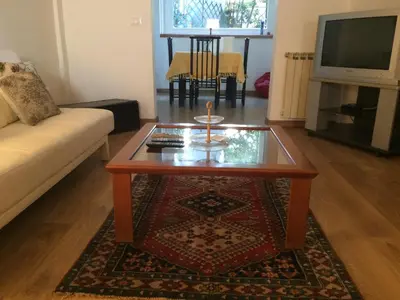 a living room with a coffee table and a couch at House in Mondello in Mondello