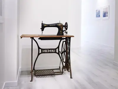 a sewing machine sitting on a table in a room at Marina di Petrolo Hotel & SPA in Castellammare del Golfo