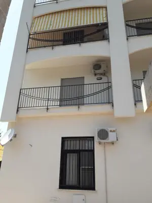 an external view of a building with a balcony at Bilocale Lungomare Carini in Carini