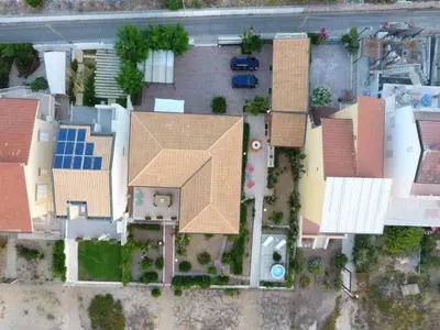 an overhead view of a house with a roof with solar panels at Dune Home alloggi sul mare in Alcamo Marina