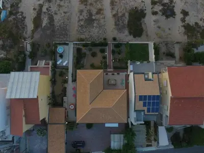 an overhead view of a house with a roof at Dune Home alloggi sul mare in Alcamo Marina