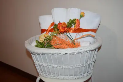 a basket with flowers in it on a chair at Vista sul porto in Palermo