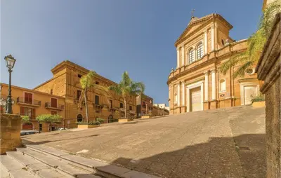 an empty street in front of a building at Villa Belvedere in Sambuca di Sicilia