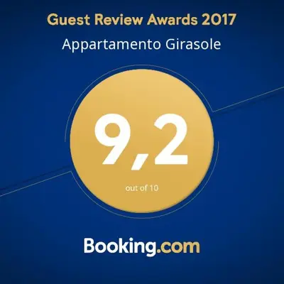 a yellow circle with the number on it at Appartamento Girasole in San Vito lo Capo